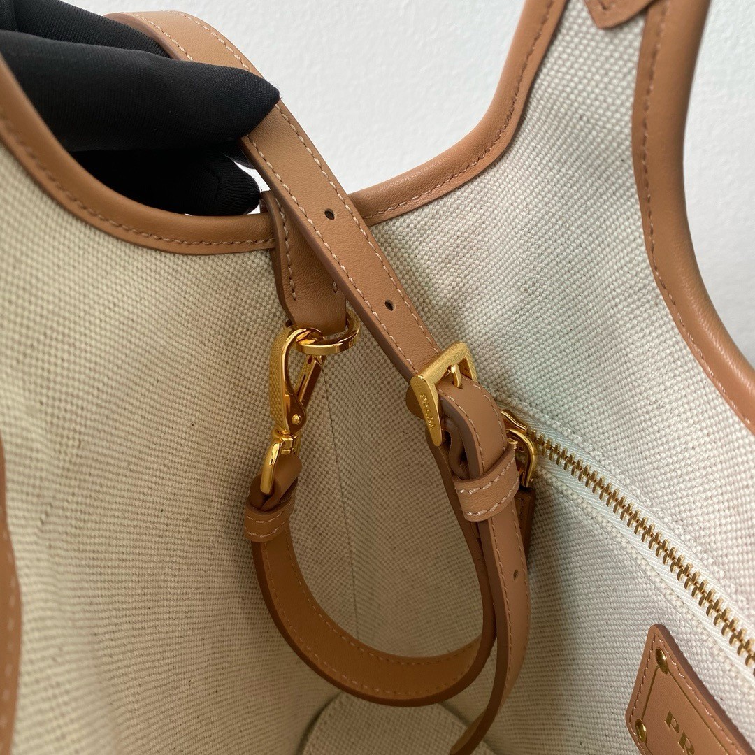 Pra*a mini buckle bag in linen blend and leather