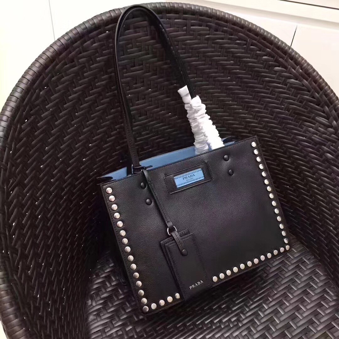 Pra*a black etiquette calfskin tote with metal stud trim