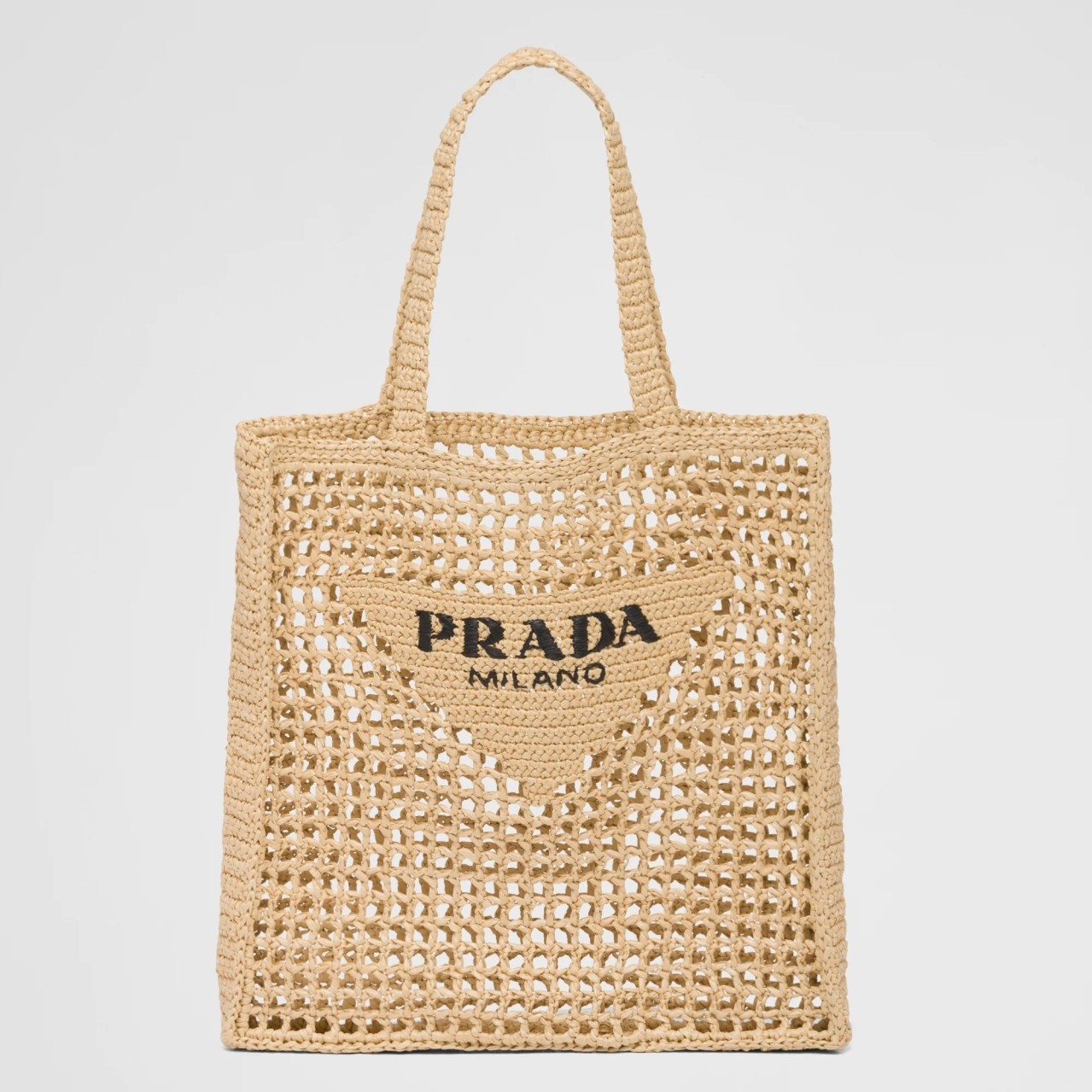 Pra*a small tote bag in beige woven raffia
