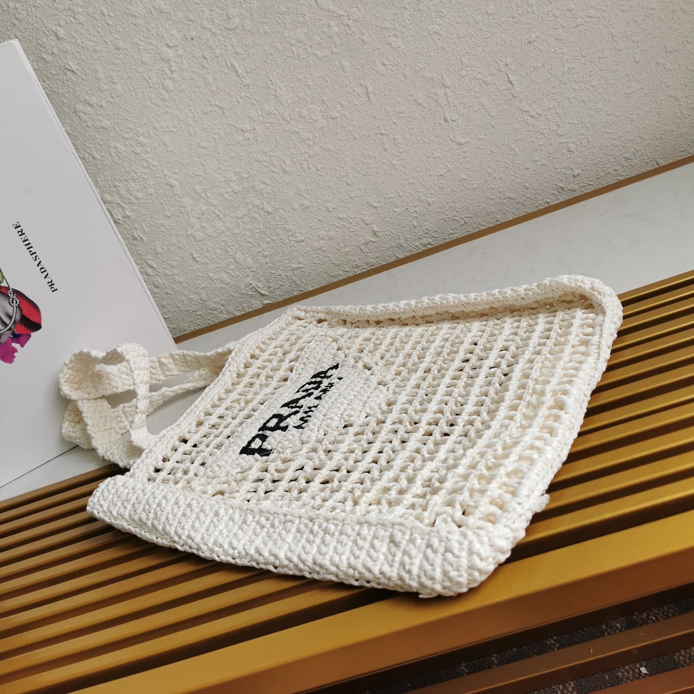 Pra*a small tote bag in white woven raffia