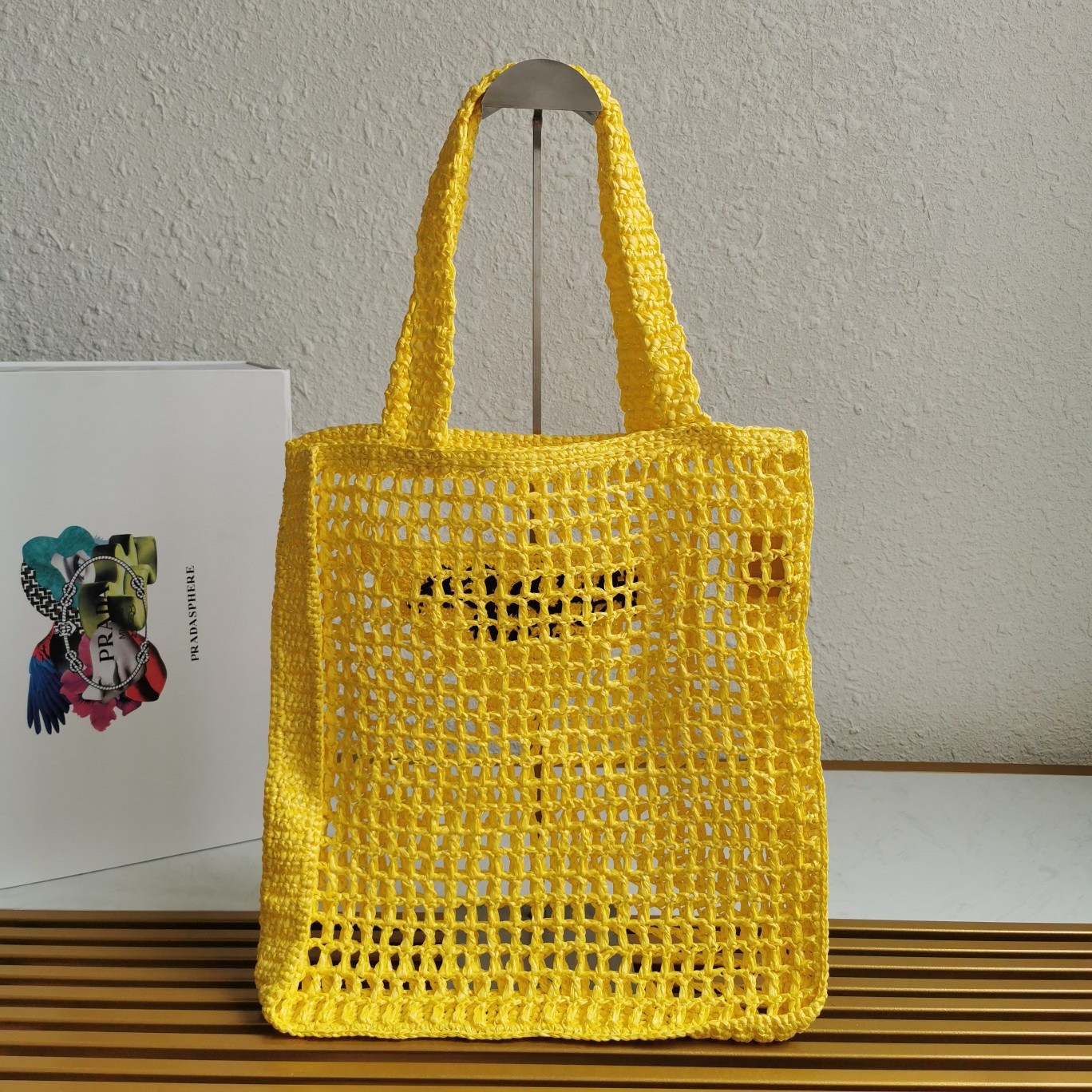 Pra*a small tote bag in yellow woven raffia