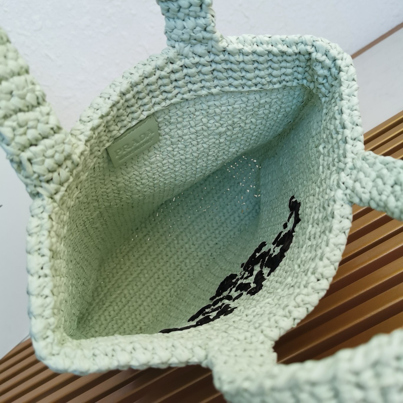 Pra*a small crochet tote bag in aqua raffia-effect yarn