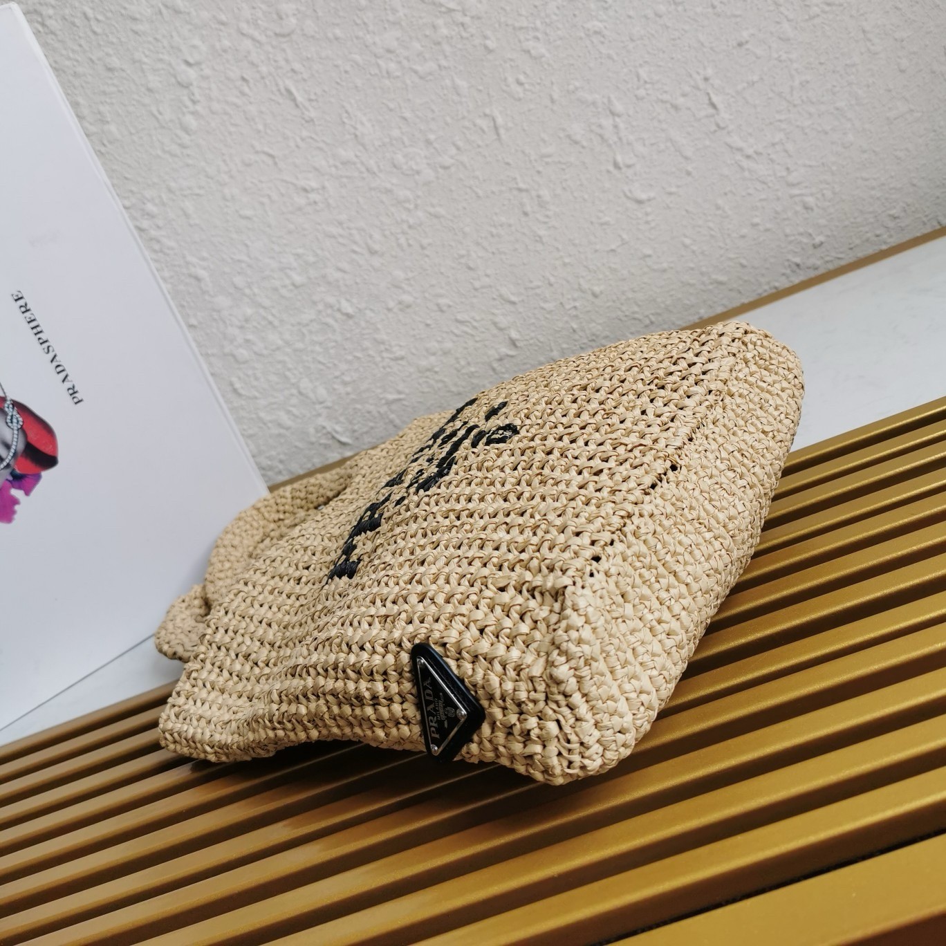 Pra*a small crochet tote bag in beige raffia-effect yarn