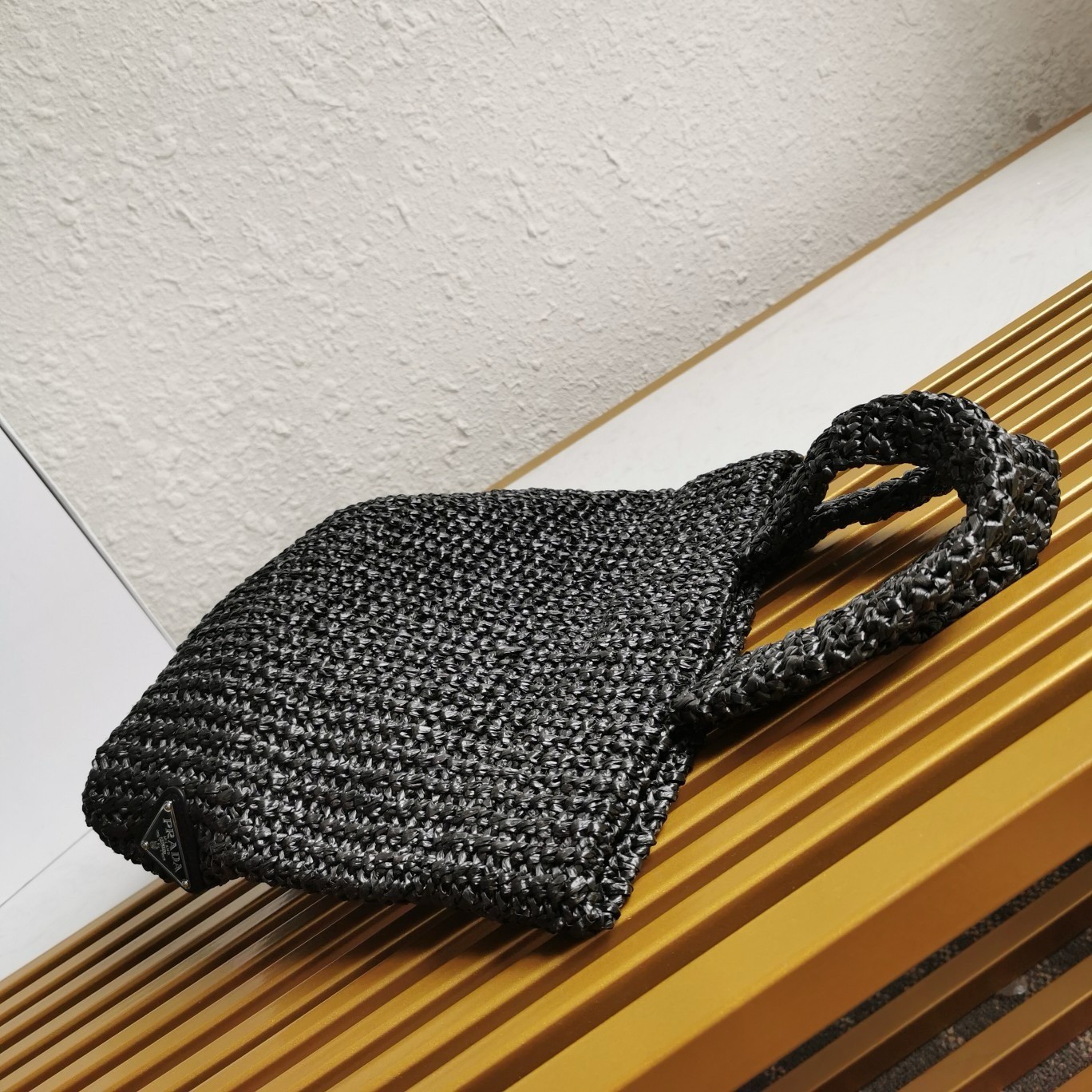 Pra*a small crochet tote bag in black raffia-effect yarn