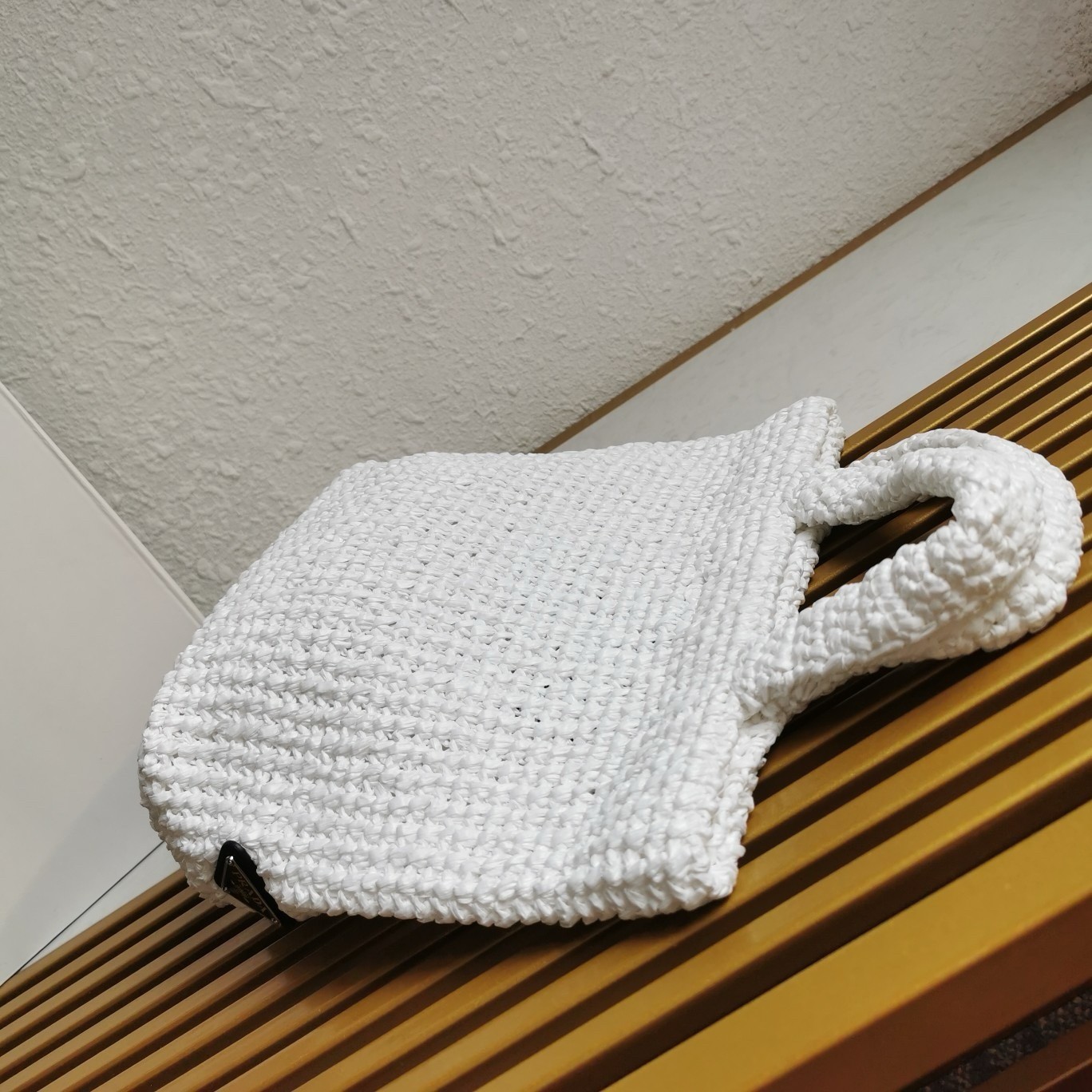 Pra*a small crochet tote bag in white raffia-effect yarn
