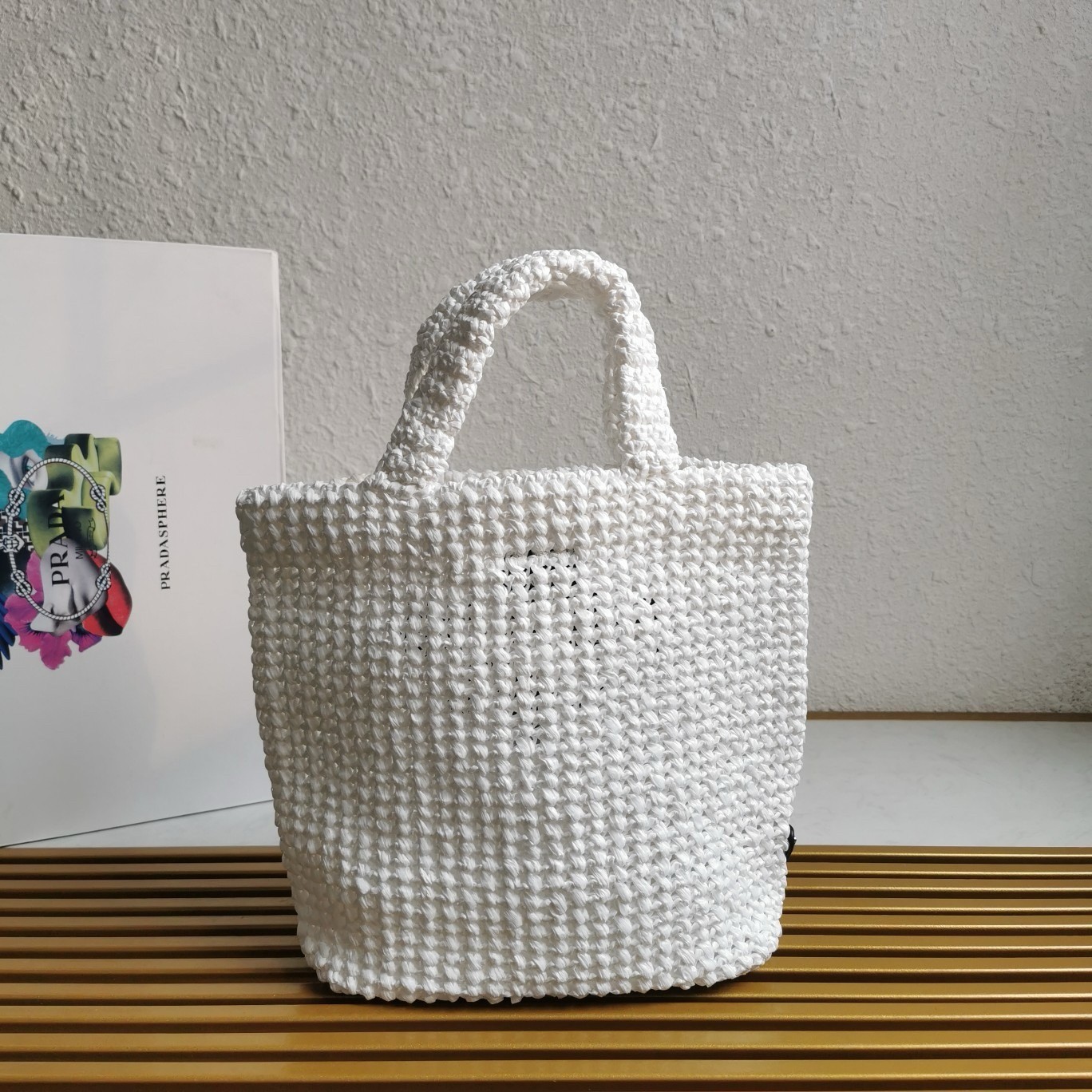 Pra*a small crochet tote bag in white raffia-effect yarn