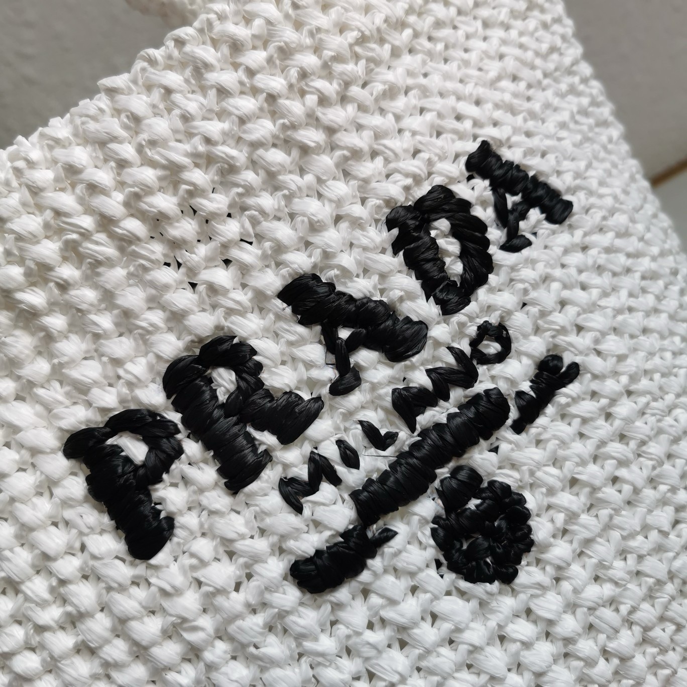 Pra*a small crochet tote bag in white raffia-effect yarn