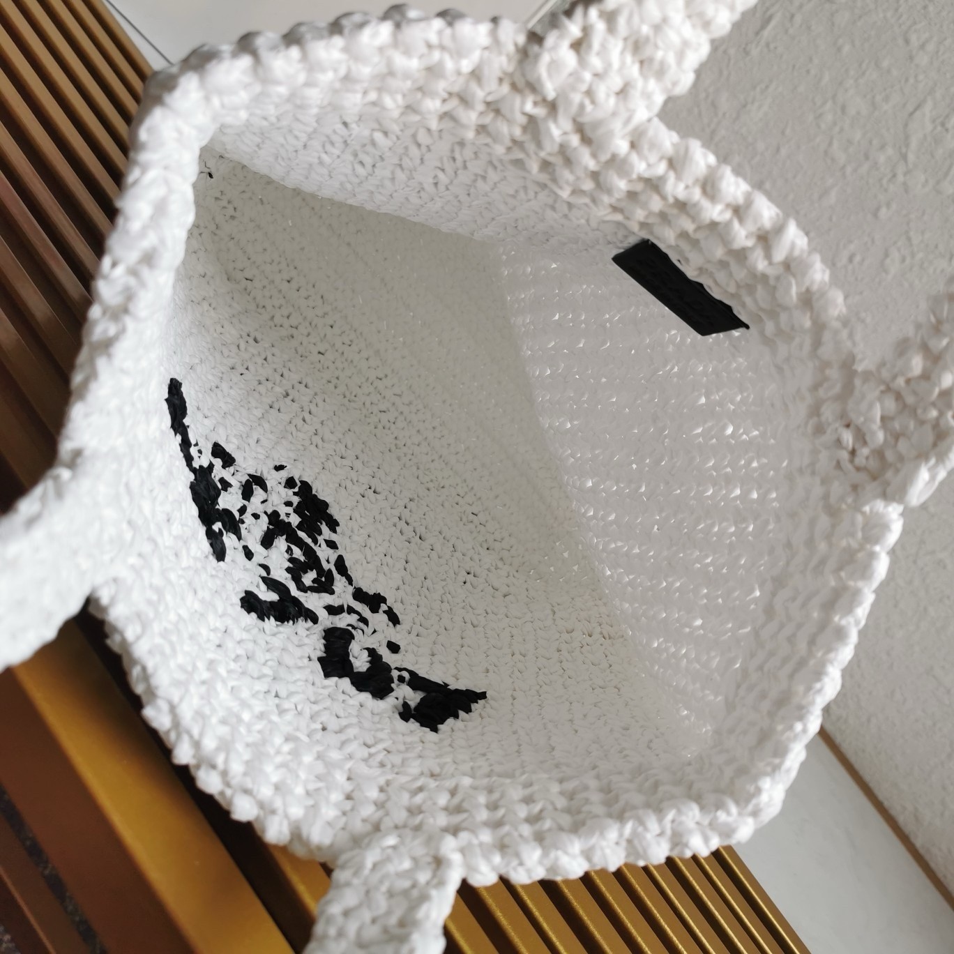 Pra*a small crochet tote bag in white raffia-effect yarn