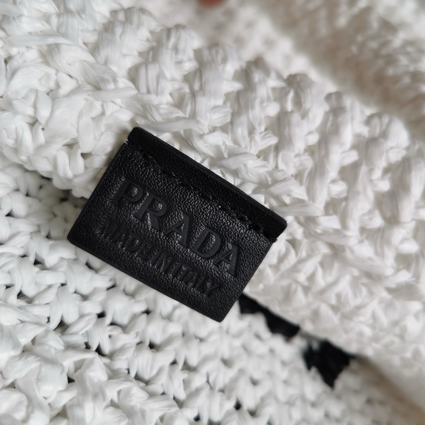 Pra*a small crochet tote bag in white raffia-effect yarn