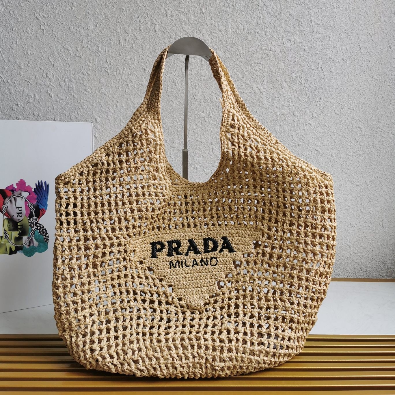 Pra*a large tote bag in beige woven raffia