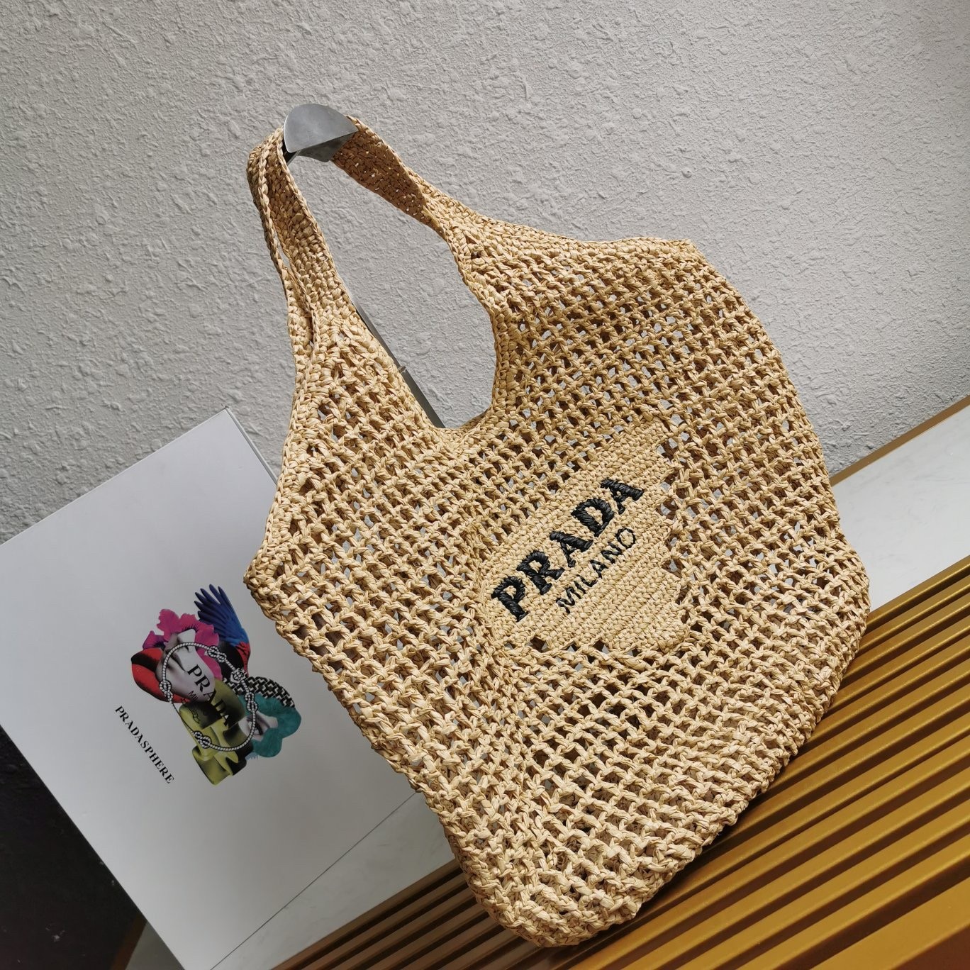 Pra*a large tote bag in beige woven raffia