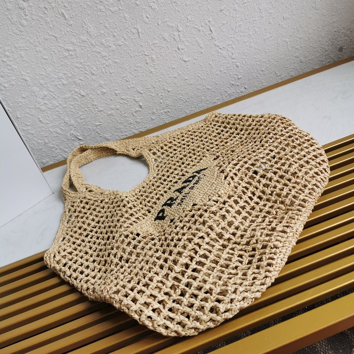 Pra*a large tote bag in beige woven raffia