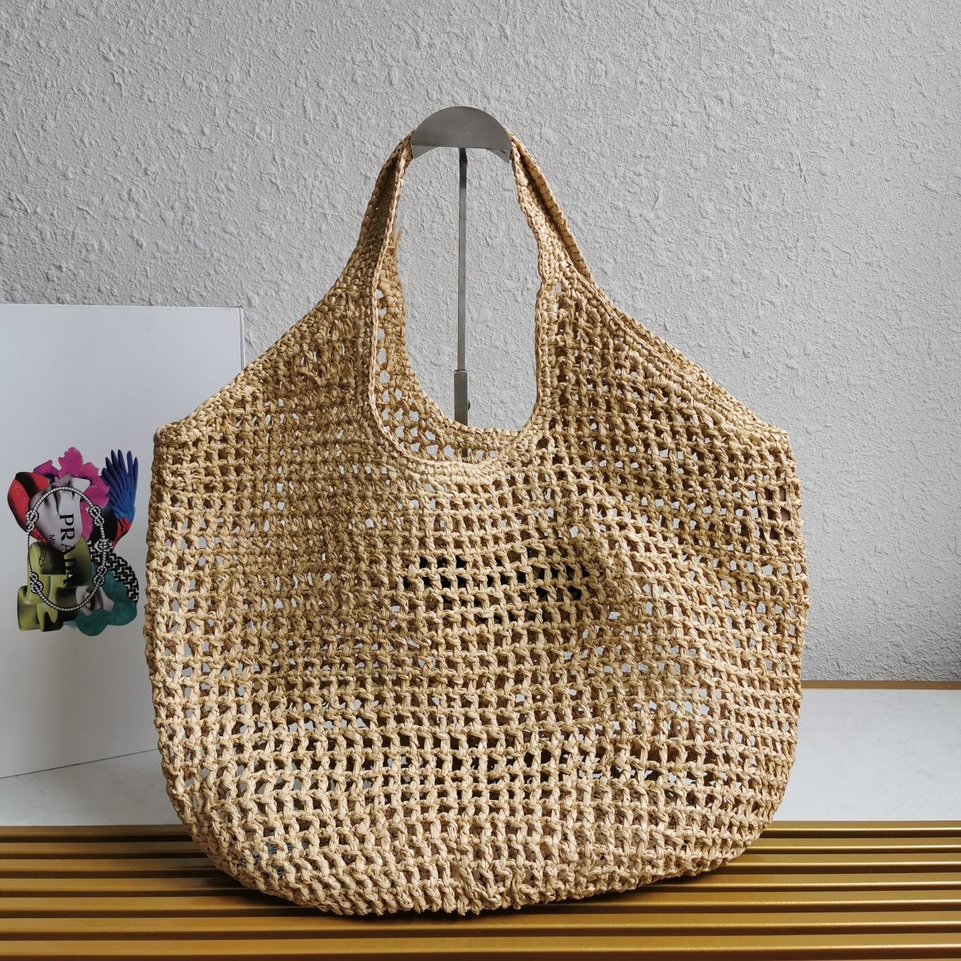 Pra*a large tote bag in beige woven raffia