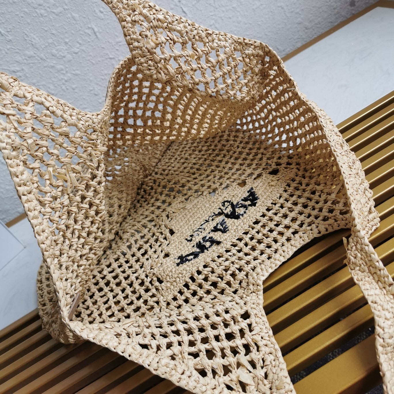 Pra*a large tote bag in beige woven raffia