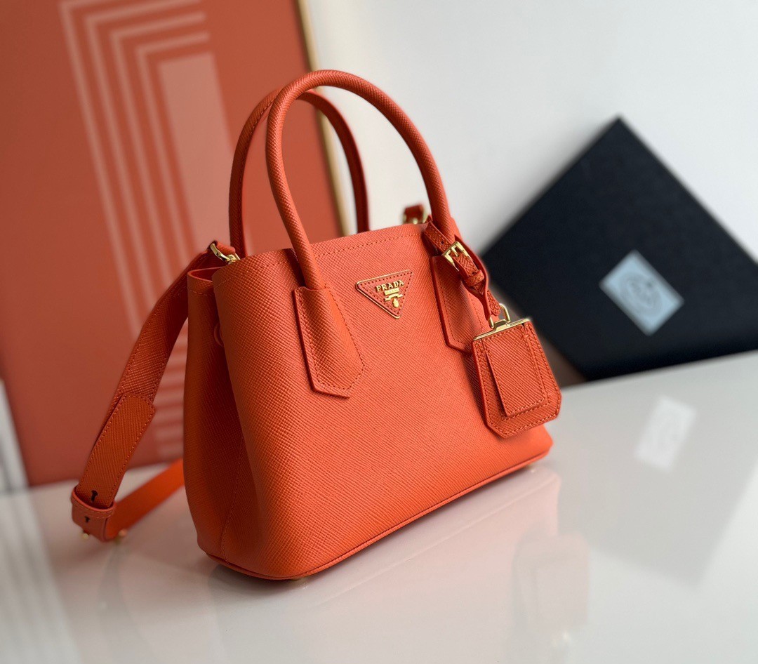 Pra*a double mini bag in orange saffiano leather