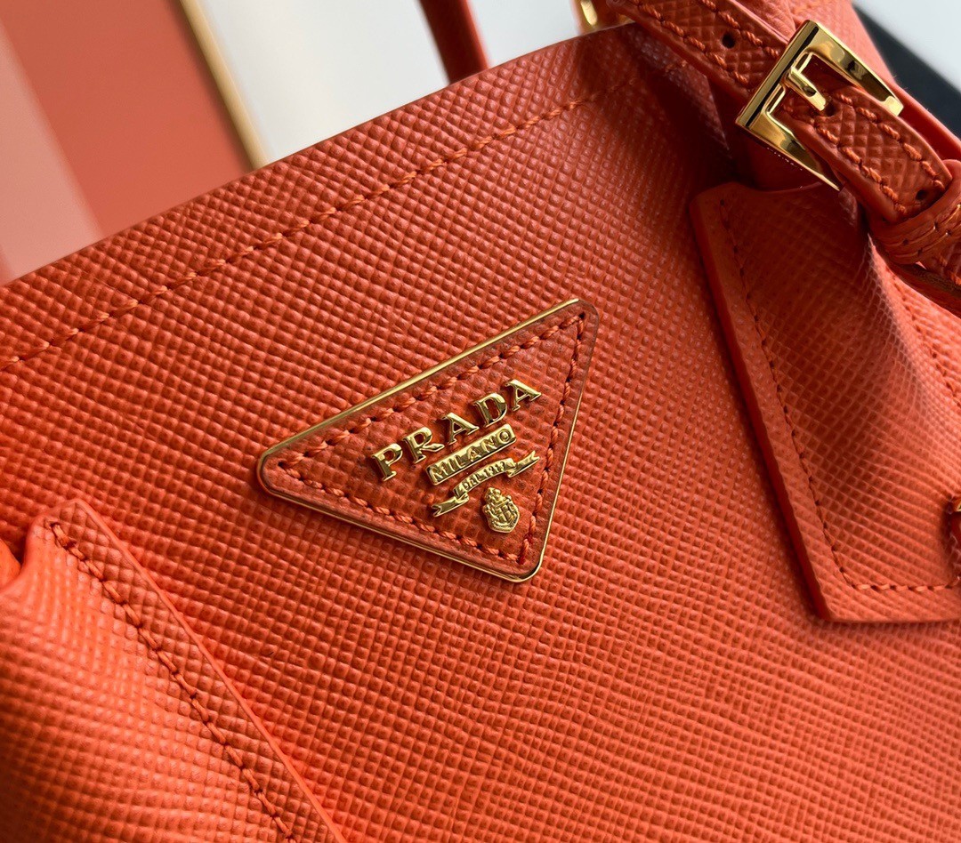Pra*a double mini bag in orange saffiano leather