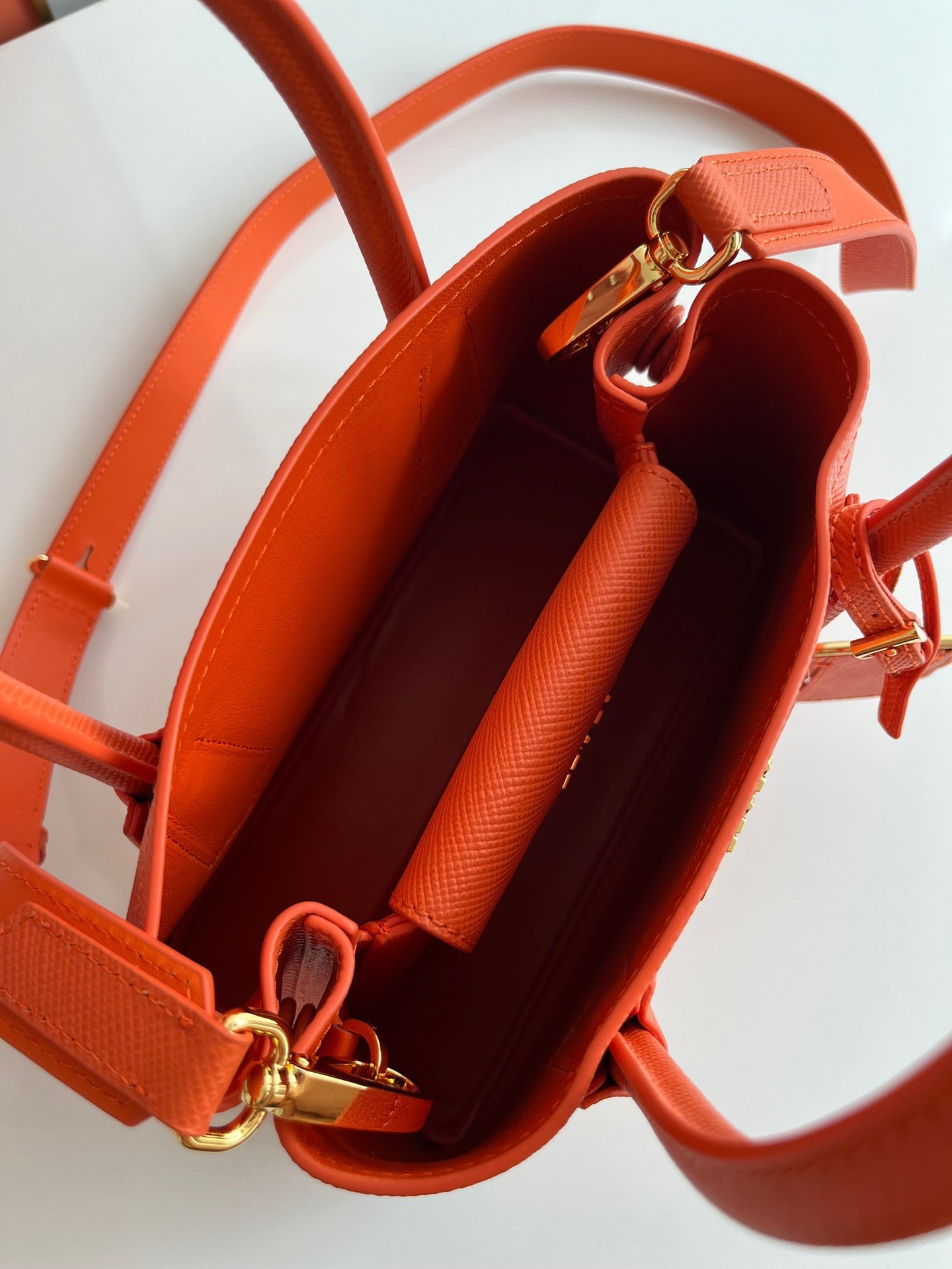Pra*a double mini bag in orange saffiano leather