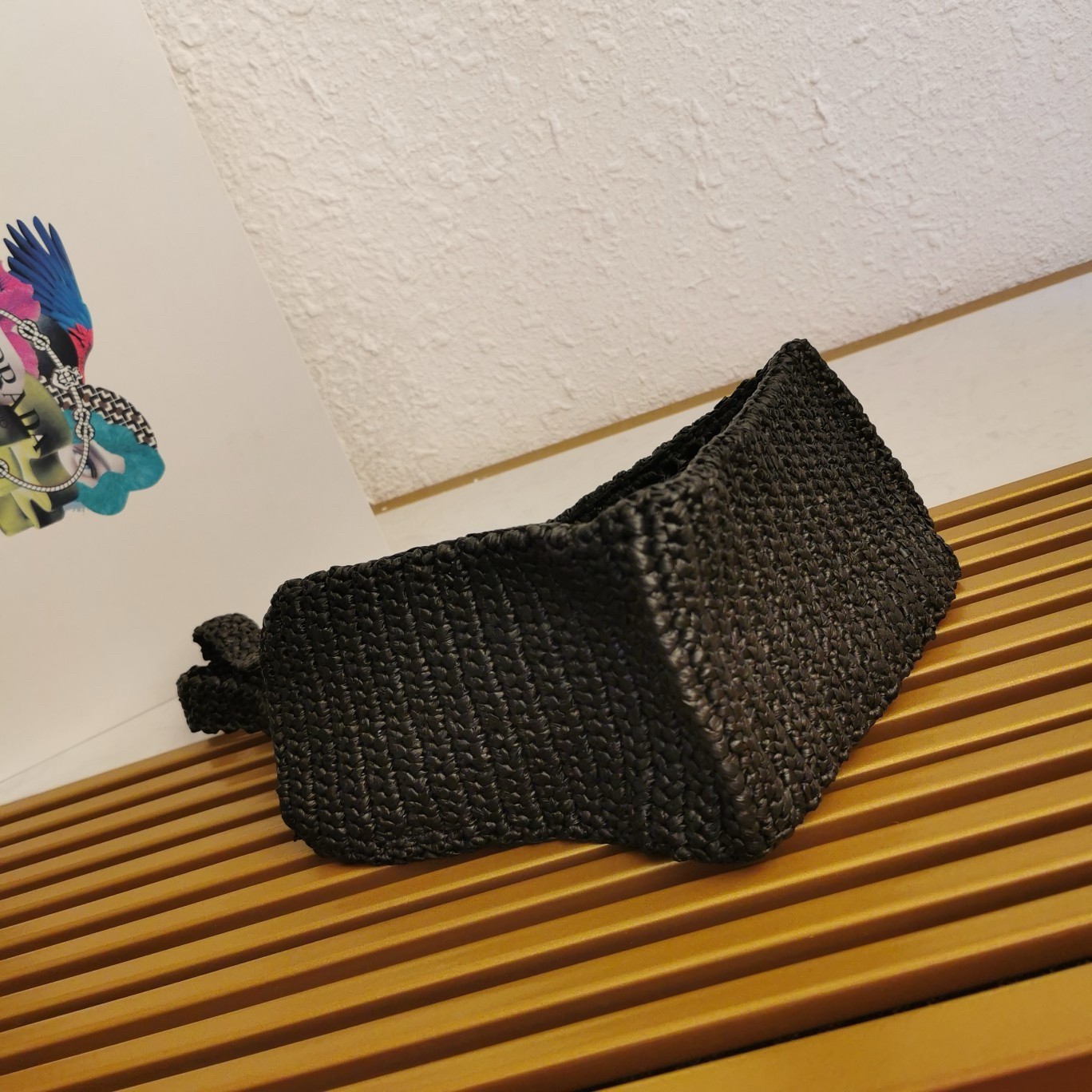 Pra*a small crochet tote in black raffia-effect yarn