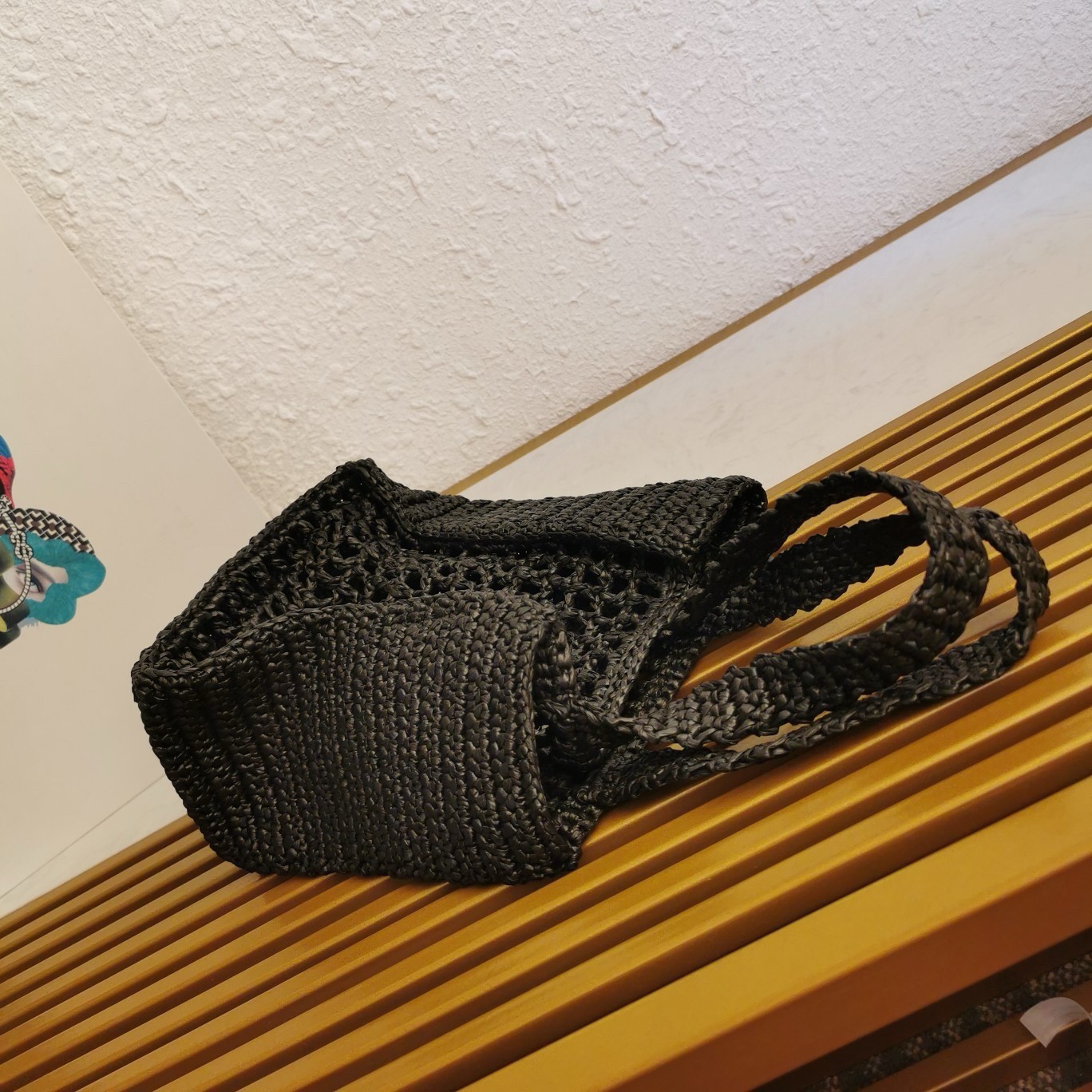 Pra*a small crochet tote in black raffia-effect yarn