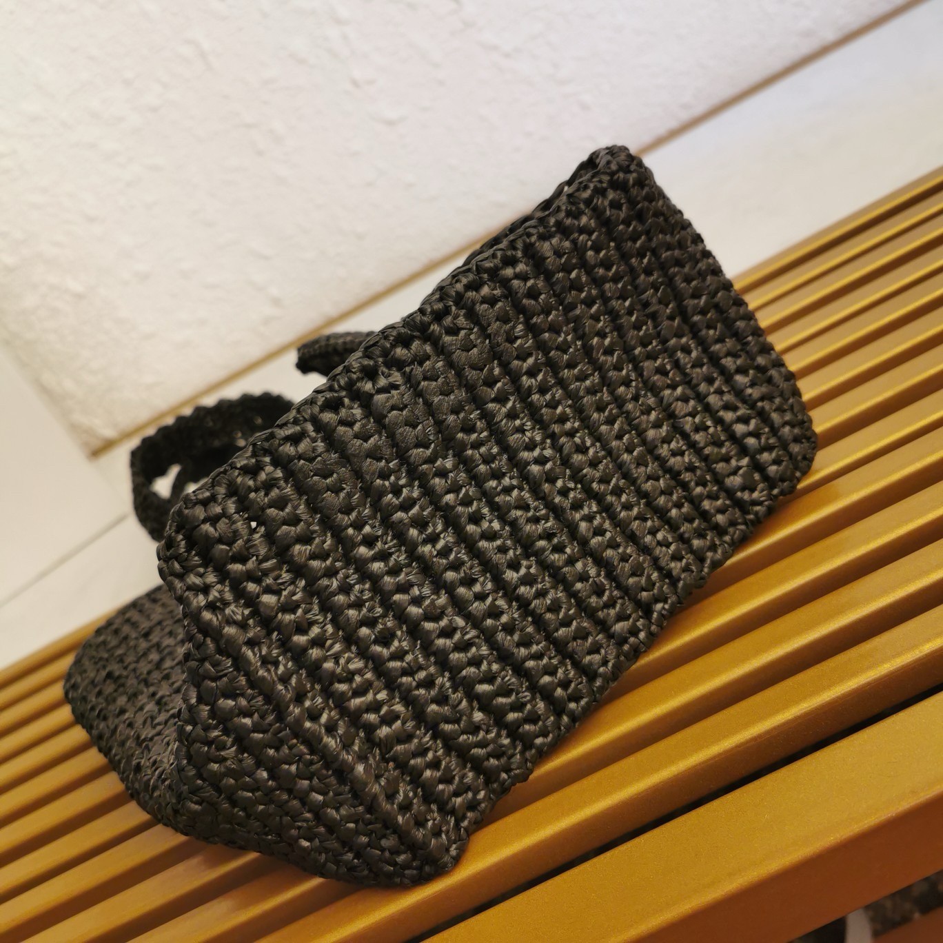 Pra*a small crochet tote in black raffia-effect yarn