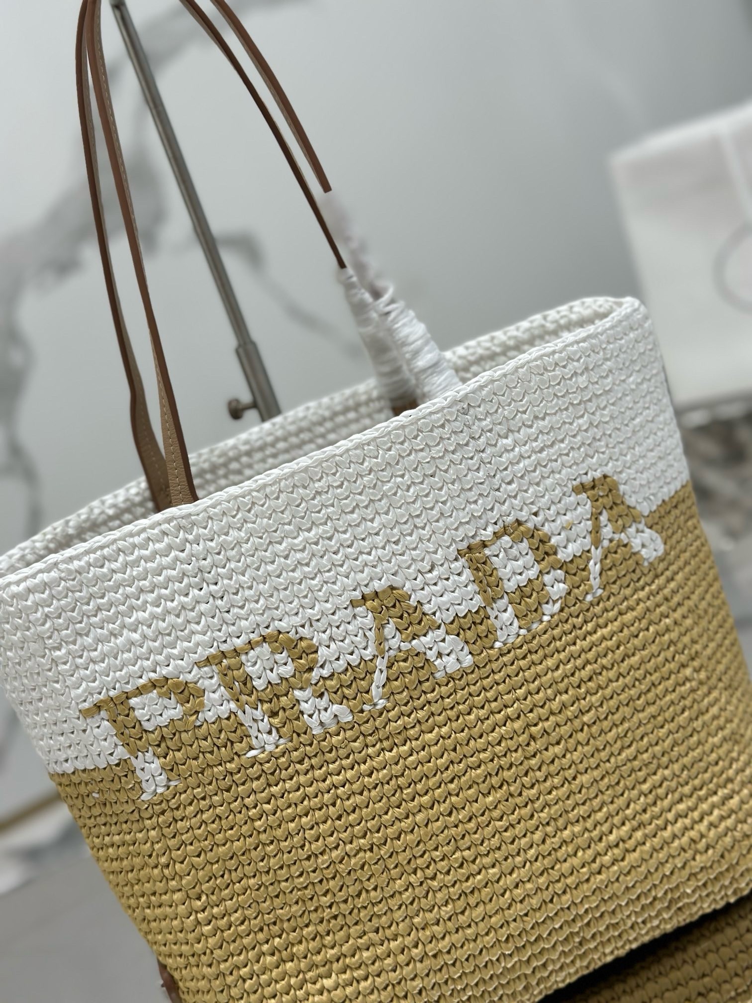 Pra*a crochet small tote bag in beige/white raffia-effect yarn