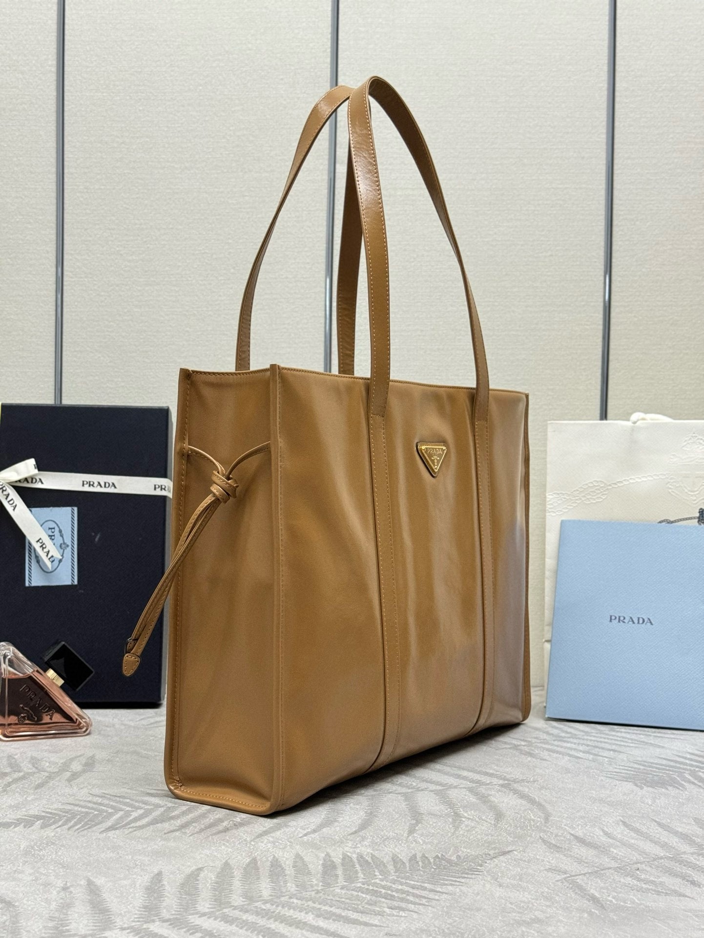 Pra*a large tote bag in brown lambskin