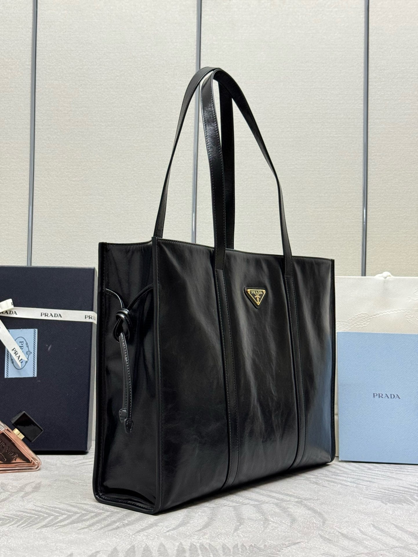 Pra*a large tote bag in black lambskin