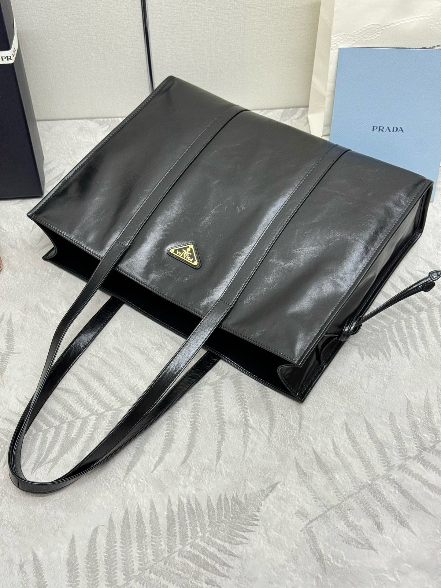 Pra*a large tote bag in black lambskin