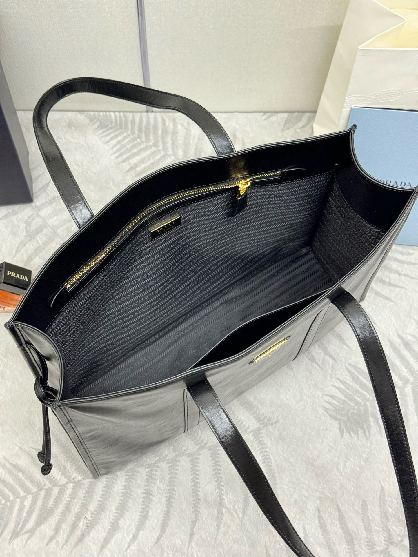 Pra*a large tote bag in black lambskin