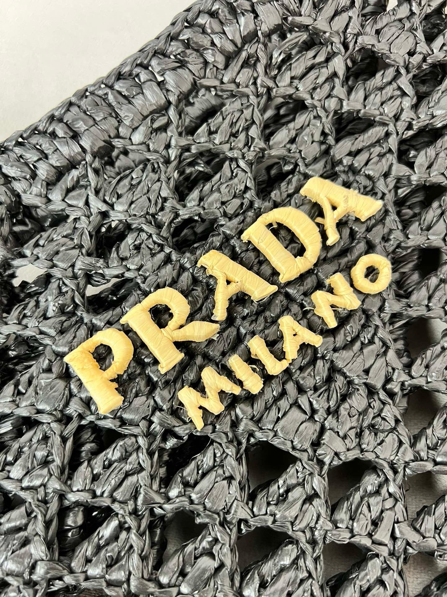Pra*a crochet tote bag in black raffia-effect yarn