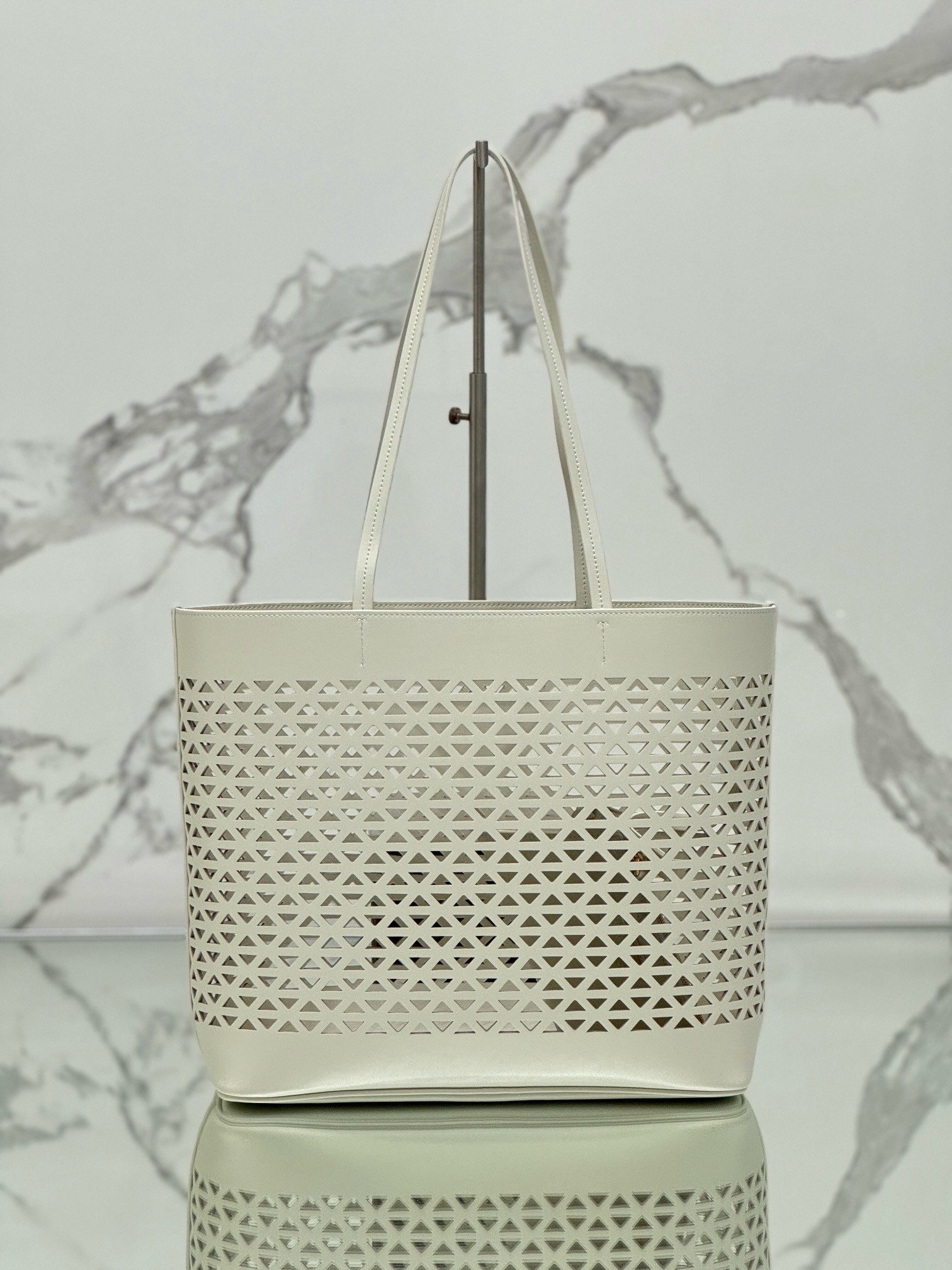 Pra*a large tote bag in white perforated leather