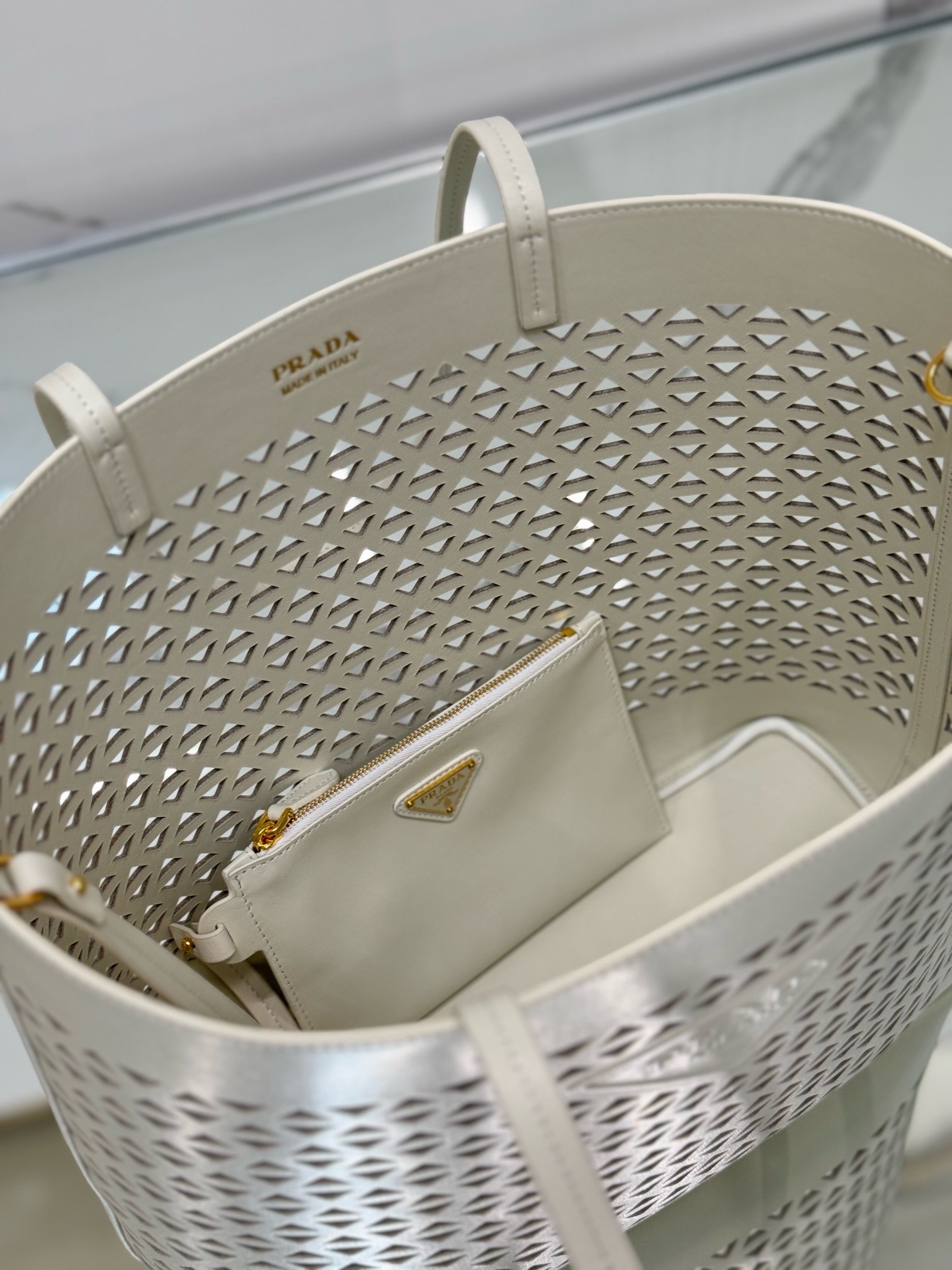 Pra*a large tote bag in white perforated leather