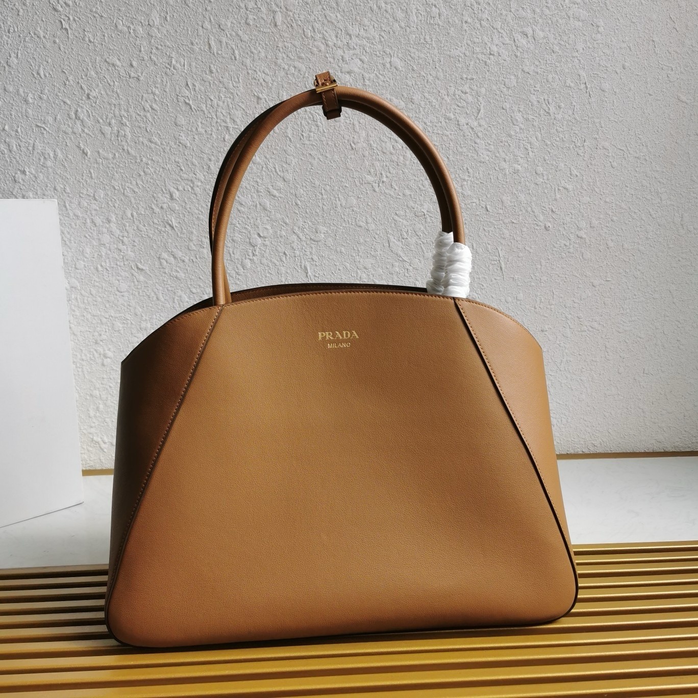 Pra*a large tote bag in caramel smooth calfskin
