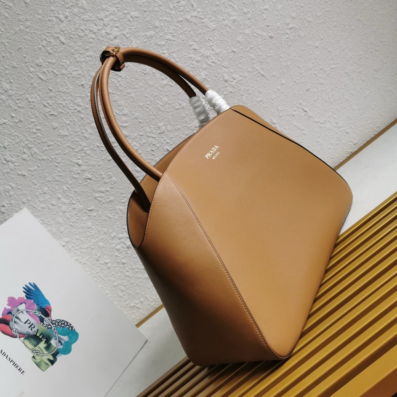 Pra*a large tote bag in caramel smooth calfskin