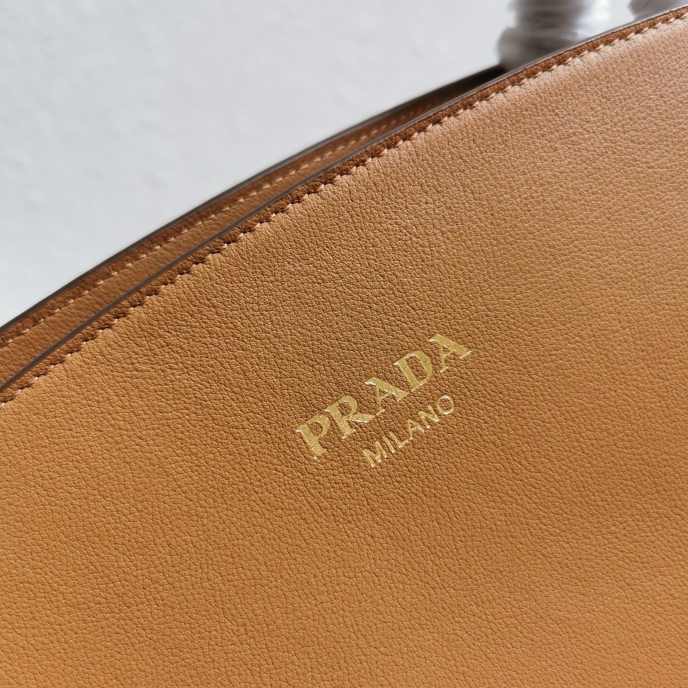 Pra*a large tote bag in caramel smooth calfskin