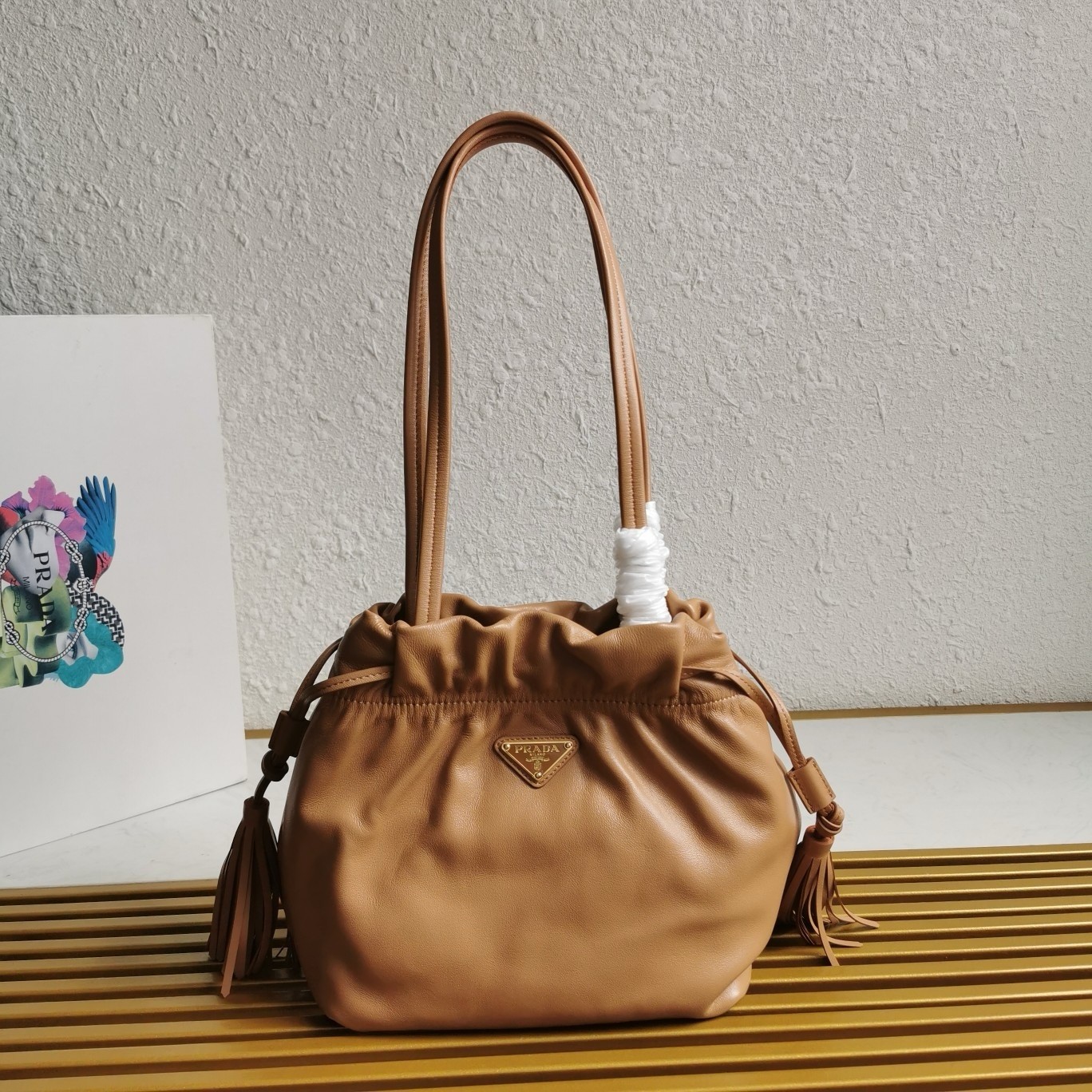 Pra*a shoulder bag in brown nappa leather