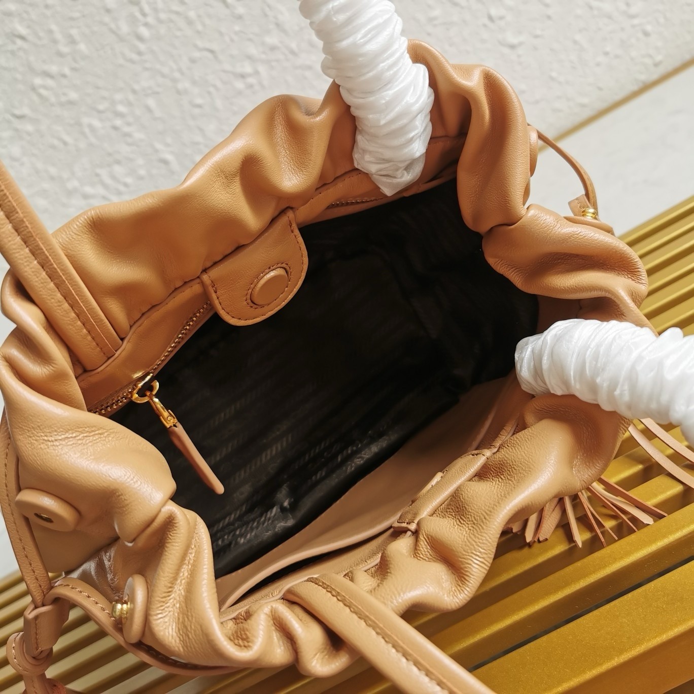 Pra*a shoulder bag in brown nappa leather