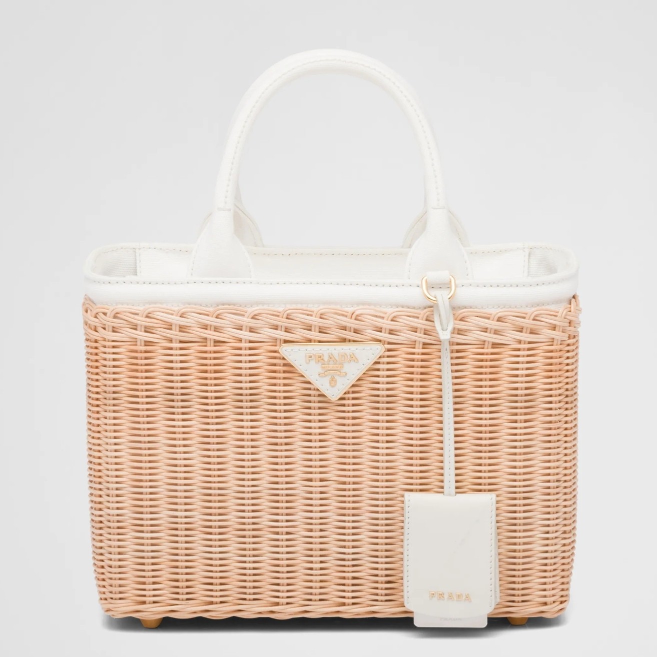 Pra*a tote bag in wicker and white canvas