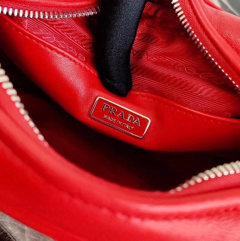 Pra*a spectrum camera bag in red nappa leather