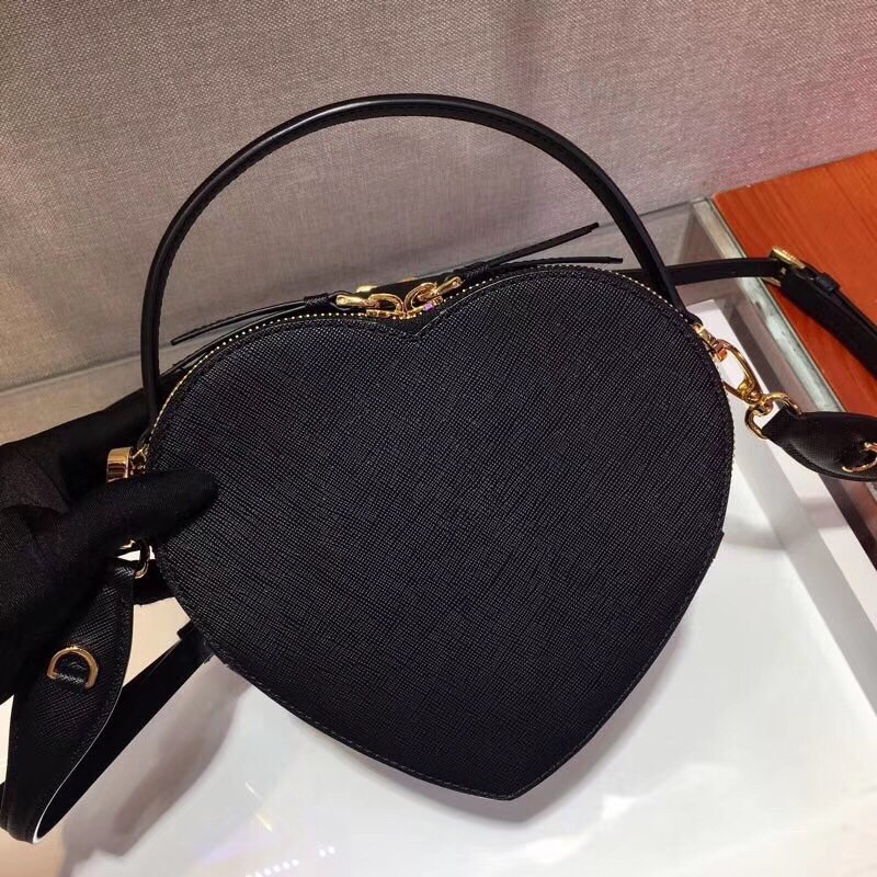 Pra*a odette heart bag in black saffiano leather