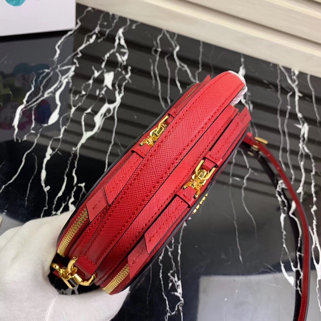 Pra*a odette heart bag in red saffiano leather