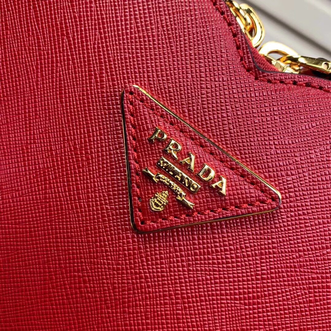 Pra*a odette heart bag in red saffiano leather