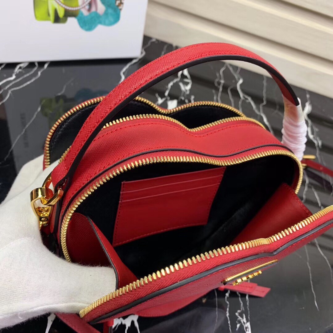 Pra*a odette heart bag in red saffiano leather