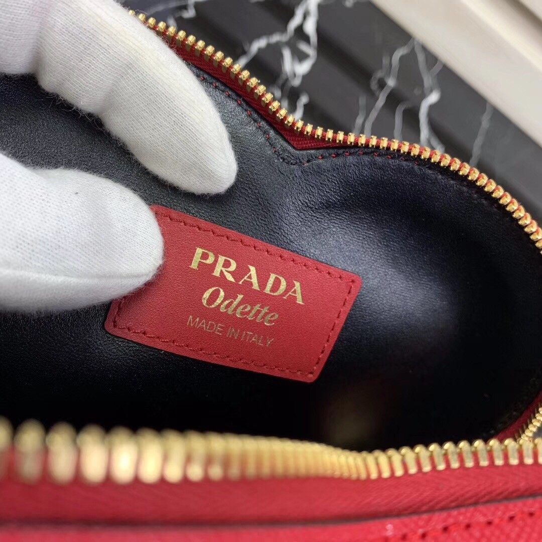Pra*a odette heart bag in red saffiano leather