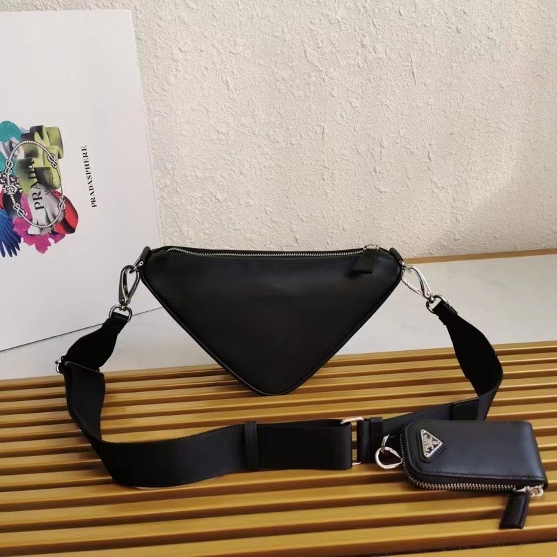 Pra*a triangle shoulder bag in black leather
