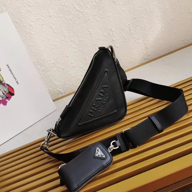 Pra*a triangle shoulder bag in black leather