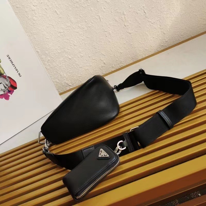 Pra*a triangle shoulder bag in black leather