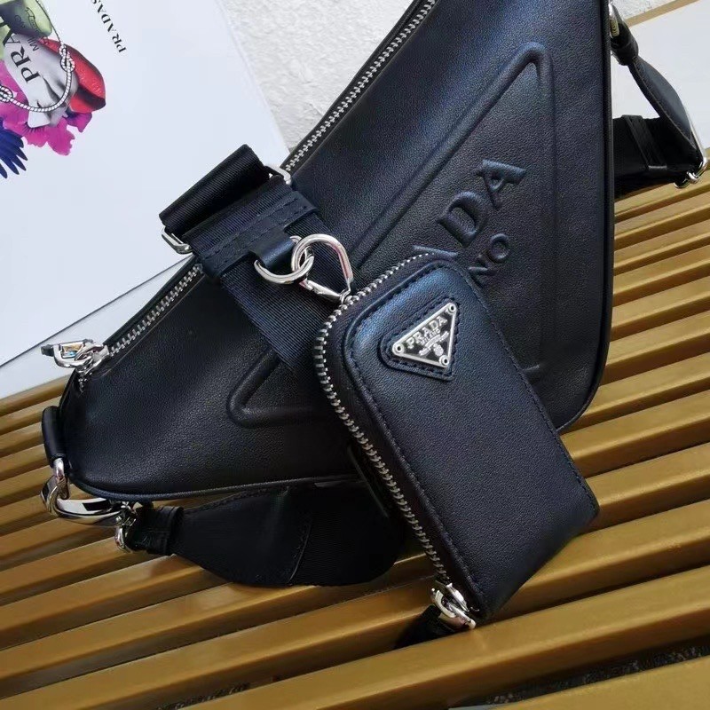 Pra*a triangle shoulder bag in black leather