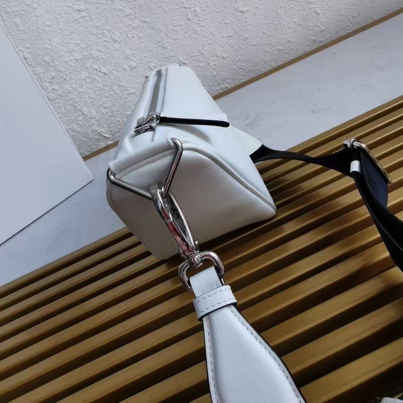 Pra*a triangle shoulder bag in white leather
