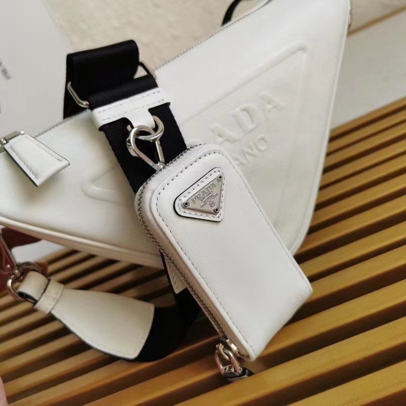 Pra*a triangle shoulder bag in white leather